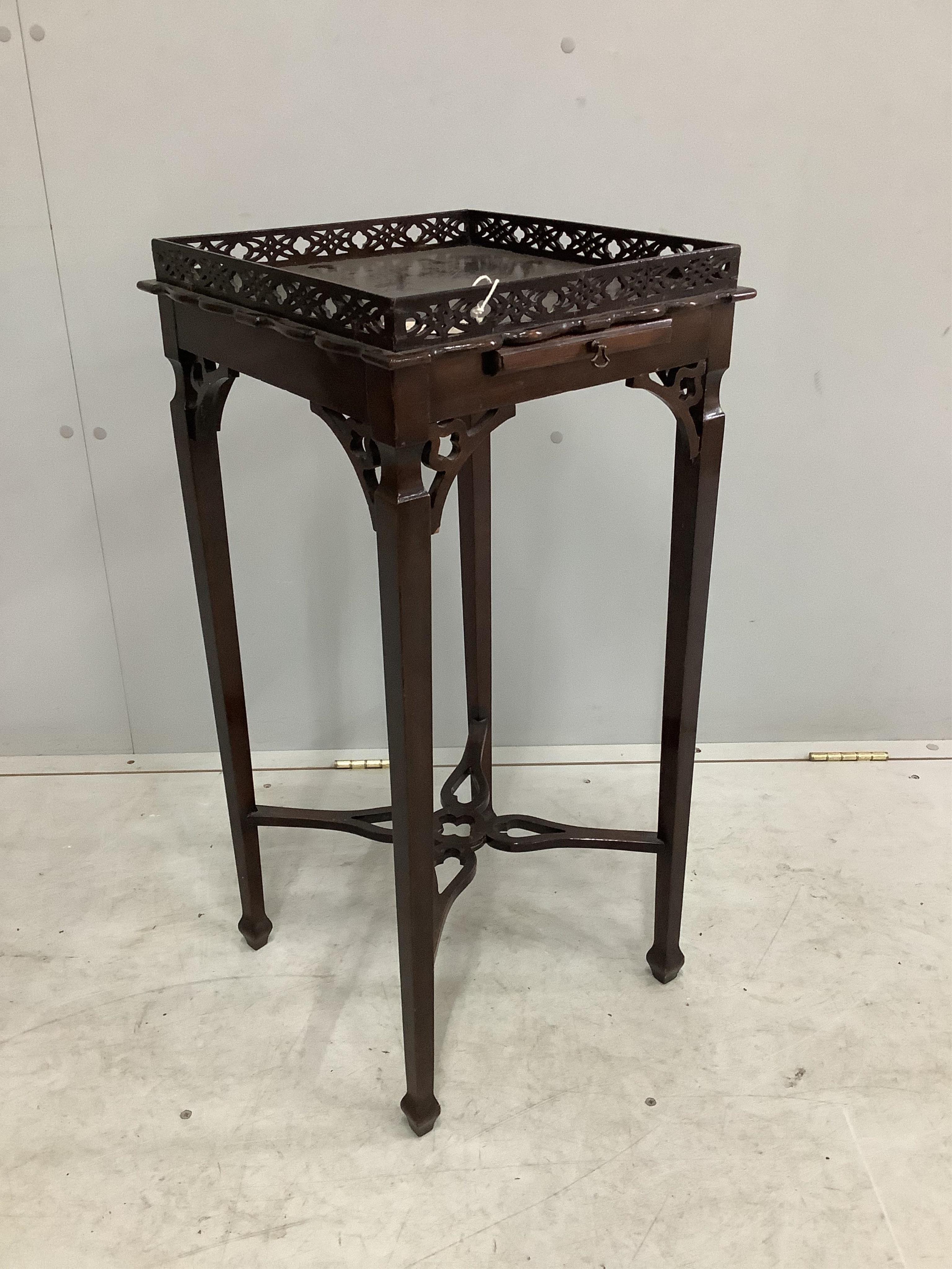 A George III style mahogany urn stand, width 36cm, height 75cm. Condition - fair